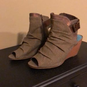 Olive colored booties size 7.